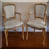 F24. Pair of open arm chairs pickled wood. Wear to upholstery. 36”h x 26”w x 20”d - $48 each 